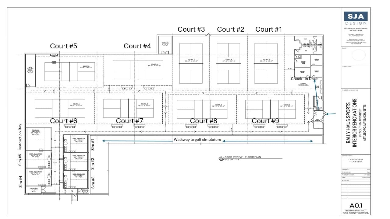 Code review floor plan of Rally Haus Sports by SJA Design showing nine numbered pickleball courts across the main floor, a walkway leading to five numbered golf simulators and an instruction bay in the lower left wing, with a lounge, pro shop, check-in desk, entry vestibule, and restrooms with showers along the right side.